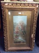 A pair of gilt framed watercolours.