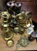 A quantity of brass and copper ware.