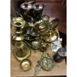 A quantity of brass and copper ware.