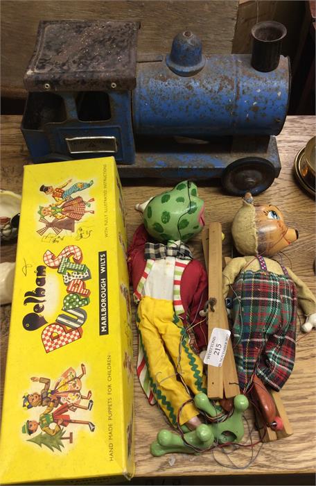 A Pelham puppet together with other toys.