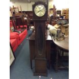 An oak mounted Grandmother clock.