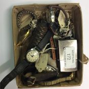 A box containing watches and wristwatches.