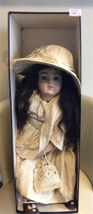 A boxed figure of a doll.