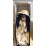 A boxed figure of a doll.