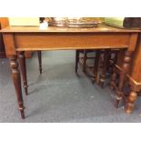 An Edwardian side table.