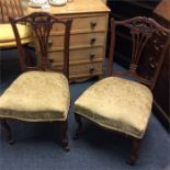 A pair of Edwardian nursing chairs.