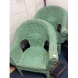 A pair of green Loom chairs.