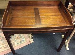 A small shelf, stool and a butler's tray.