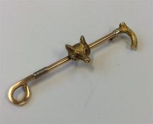 A good quality 14 carat brooch in the form of a ri