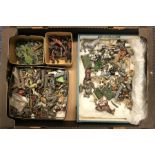 A box containing lead figures and farmyard animals