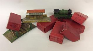 Boxes containing old Hornby wagons and trains. Est