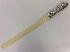 An unusual silver Victorian large paper knife with