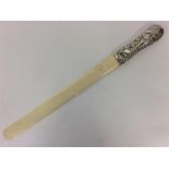 An unusual silver Victorian large paper knife with