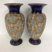 ROYAL DOULTON: A pair of large baluster shaped vas