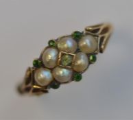 An Antique emerald and pearl ring. (Broken shank).