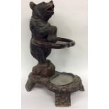 A good carved hall stand in the form of a bear on