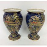 CARLTON WARE: A pair of decorative vases of Orient