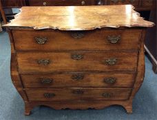 A good Continental bow front chest with wavy edge