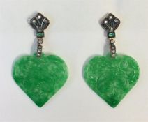 A pair of unusual carved jade pendant earrings mou