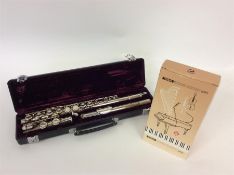 A Buffet flute contained within a fitted box toget