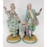 A pair of good Continental decorative figures on p