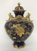 A large French blue gilded vase and cover. Approx.