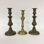 Two pairs of circular brass candlesticks. Est. £30