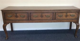 An Georgian three drawer dresser base with Tunbrid