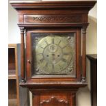 A good Georgian oak cased grandfather clock, the b