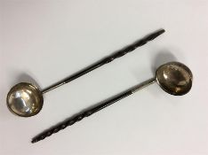 A pair of Victorian toddy ladles with whalebone ha