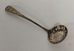 A Georgian sifter ladle with OE handle. London. By