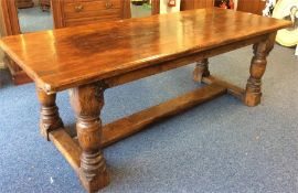 A massive Antique oak refectory table with stretch
