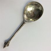 A Continental silver spoon with gilt top and engra