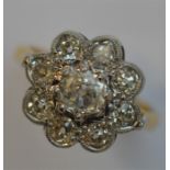 A large diamond circular daisy head cluster ring i