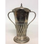 A good tapering silver cup with half fluted decora