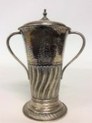A good tapering silver cup with half fluted decora