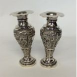 A pair of Indian tapered spill vases with wavy edg