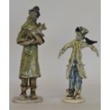 NORMAN UNDERHILL: A pair of large pottery figures