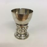 A small Continental goblet mounted with stylish fl