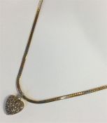 A good Antique diamond heart shaped pendant with l