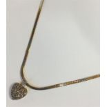 A good Antique diamond heart shaped pendant with l