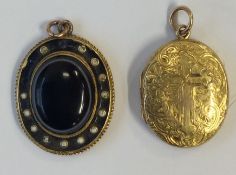 A high carat oval locket with hair centre together