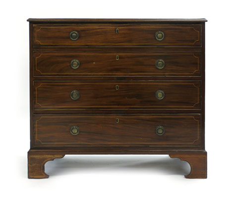 A George IV mahogany and strung chest of four graduated drawers,