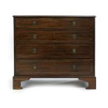 A George IV mahogany and strung chest of four graduated drawers,