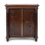 A Regency rosewood and gilt metal mounted cabinet,