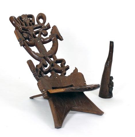 A 20th century Malawi carved hardwood birthing chair together with an African carved rosewood