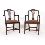 A pair of George III mahogany and upholstered carvers on square straight legs CONDITION