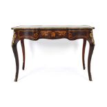 A 19th century and later French bureau plat, the kingwood, rosewood,