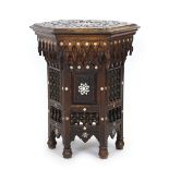A 19th century Islamic occasional table of hexagonal form,