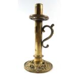 A Palmer & Co. of London brass chamberstick with a scrolled handle, h.